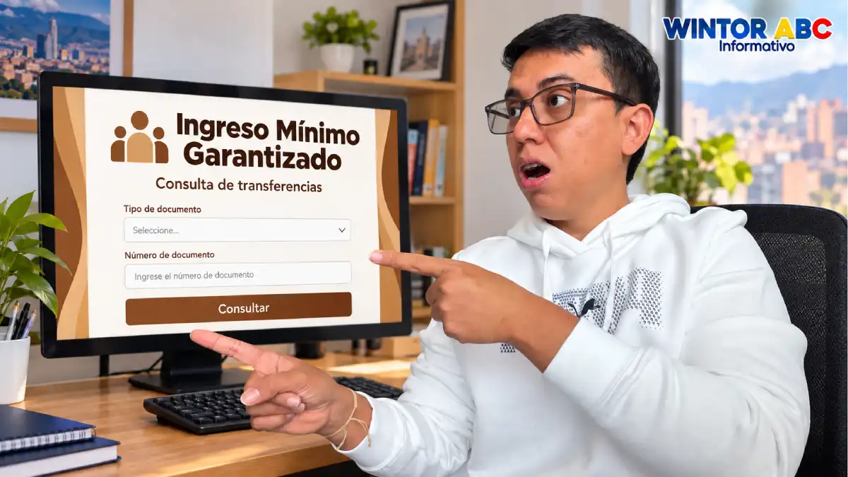 Wintor ABC señala un computador con una representación de la consulta de Ingreso Mínimo Garantizado.